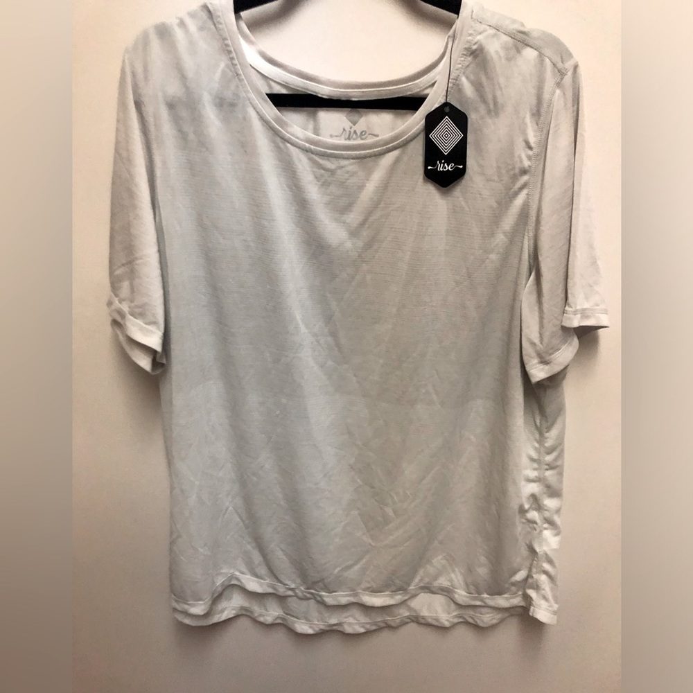 New with tags, Lularoe Confident work out top, size 3x.